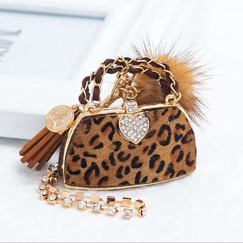 NWT Cheetah Keychain/Bag Charms clip it on wear it in so many ways it’s stylish - Picture 6 of 7
